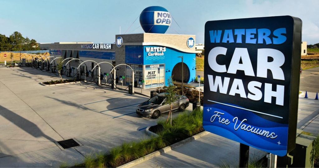  large blue and white car wash sign outside a business