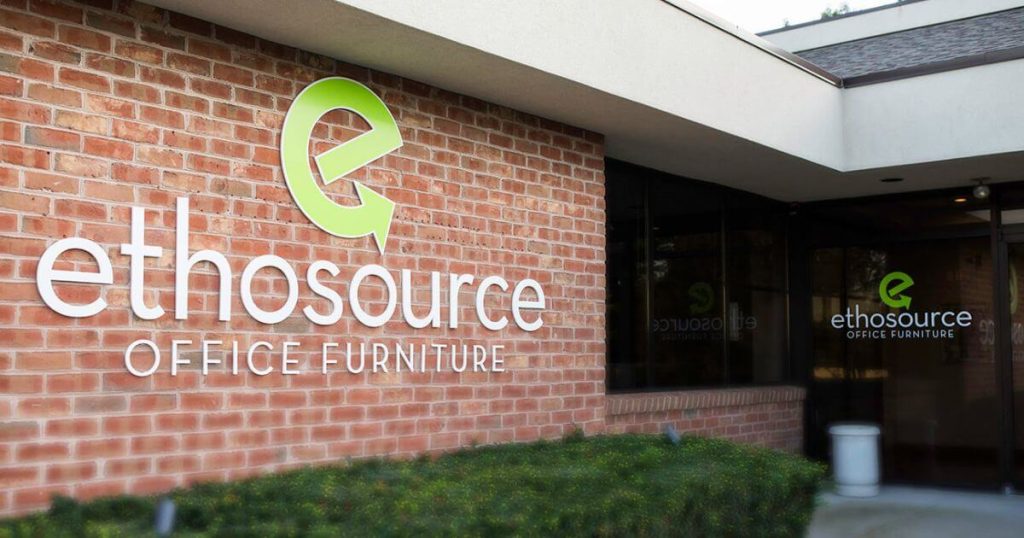  ethosource logo large sign outside on the brick siding of a business